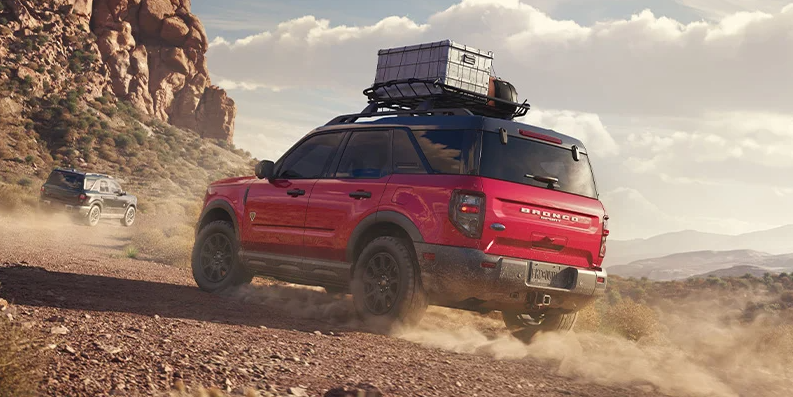 A photo of a red 2025 Ford Bronco Sport off-roading.